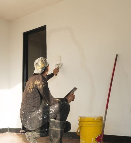 man making repairs in his house. home renovation.